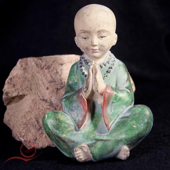 small Monk in meditation