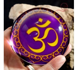 Very beautiful glass paperweight decorated with the syllable OM. Om is the sound of the universe.