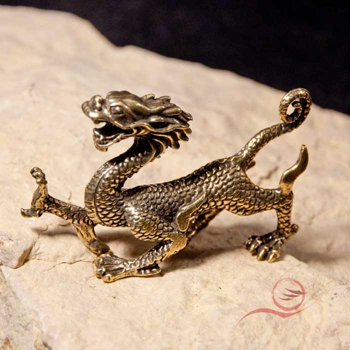 Mini brass dragon in Lyon